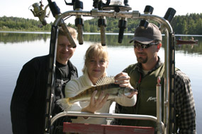 Clients of Vaparetket Fishing Guide Services and Mikko Ollila (right). 