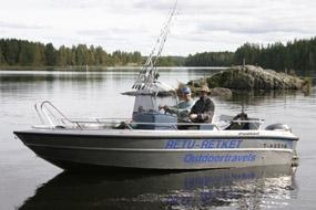 Reima Aronen and his boat